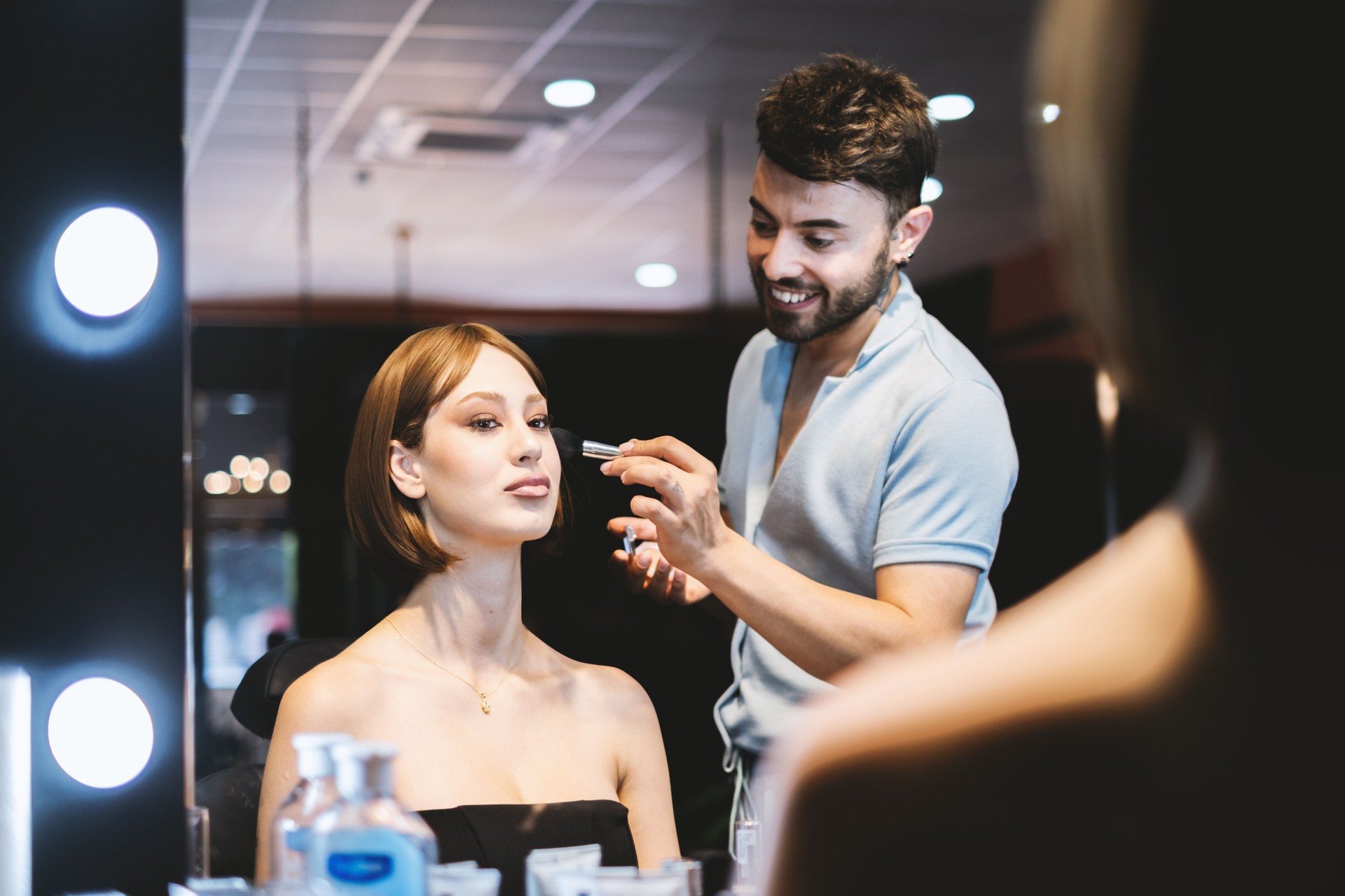 Makeup Artist And Young Woman
